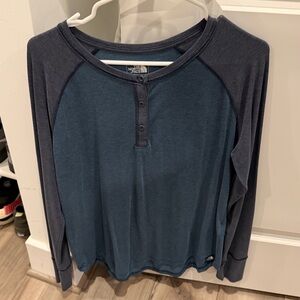 The North Face Women's Two-Tone Blue long-sleeve henley shirt.